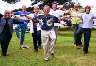 Group Qigong practice on lawn
